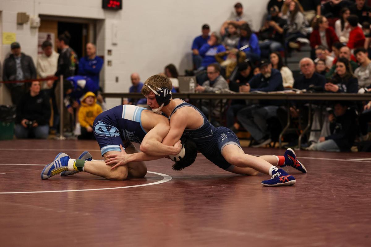 Penns Valley’s Erik Carlile fights off a takedown attempt from Central Valley’s Antonio Boni in their 127 pound finals match of the PIAA Class 2A Southwest Regional on Saturday in Altoona. Carlile beat Boni, 11-4.