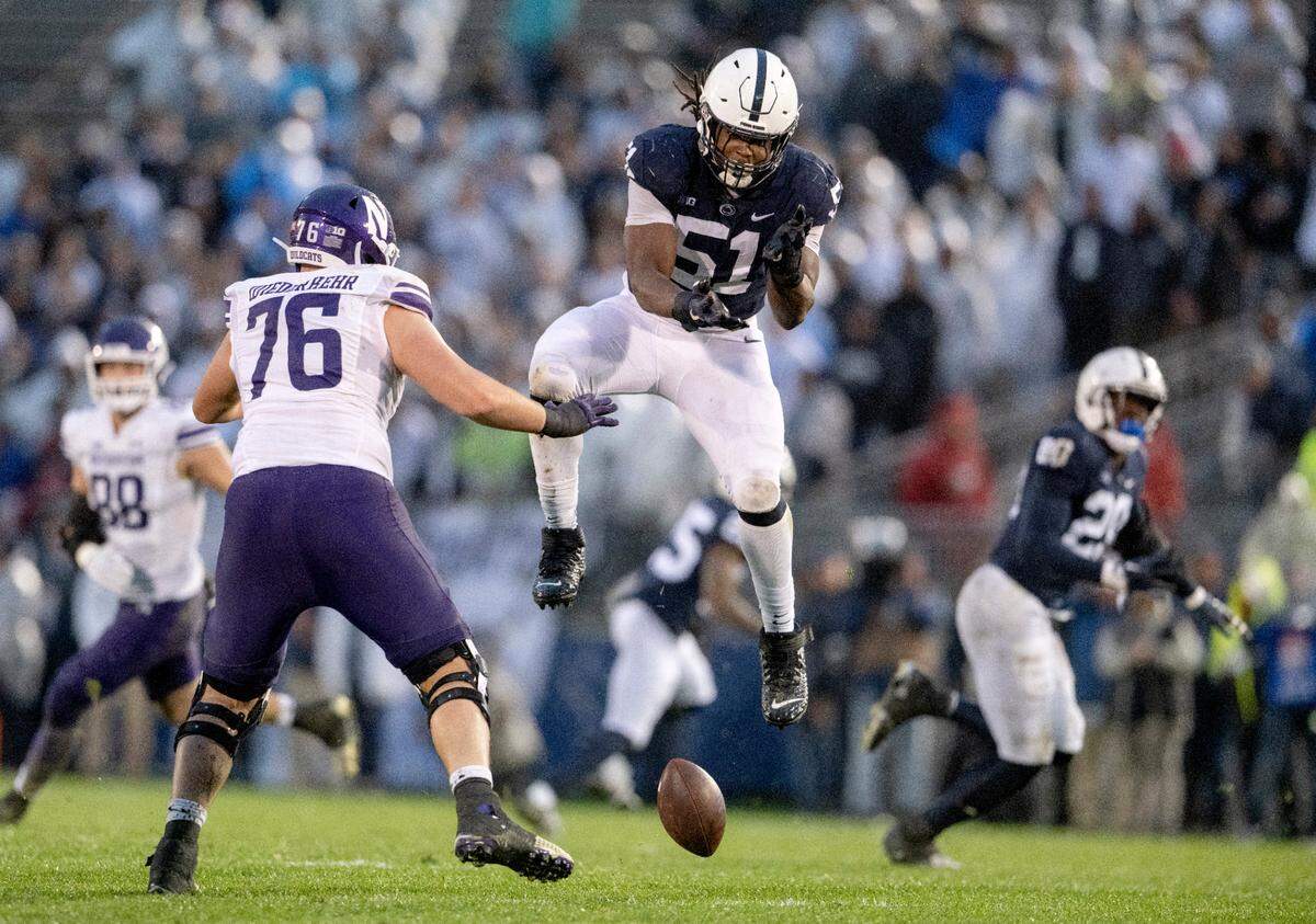Penn State defensive end Hakeem Beamon knocks down a Northwestern pass during the game on Saturday, Oct. 1, 2022.