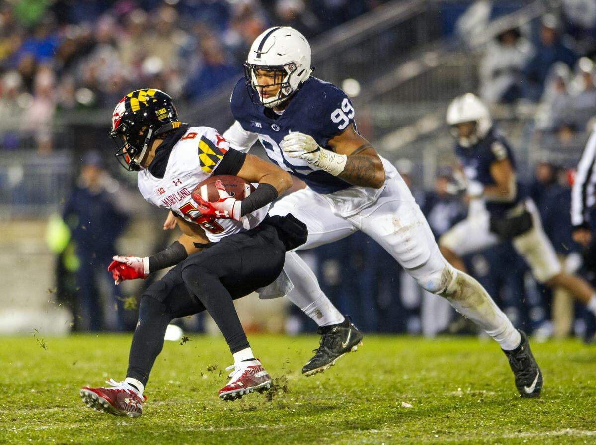 Defensive end Yetur Gross-Matos (99) runs down Maryland wide receiver Jeshaun Jones (6) during the game against Maryland at Beaver Stadium on Saturday, Nov. 24, 2018. No. 12 Penn State won 38-3.