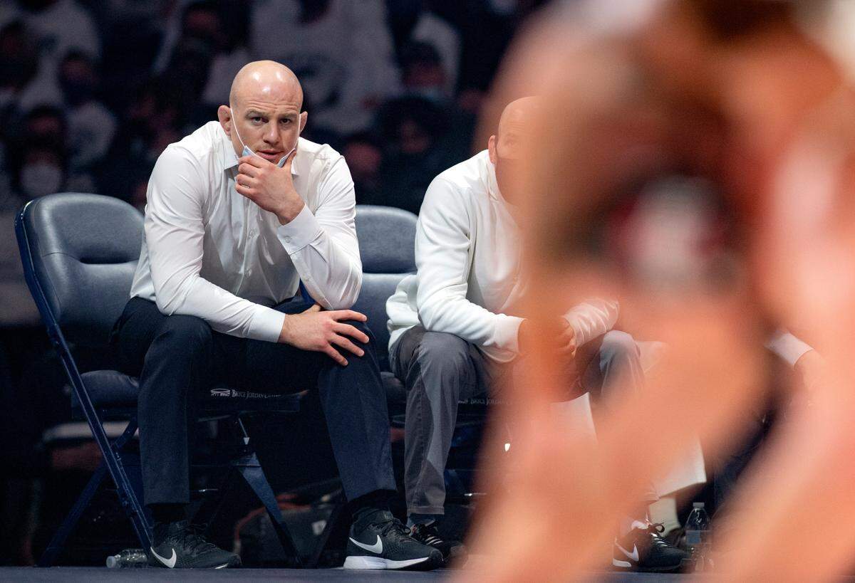 Penn State wrestling coaches Cael Sanderson watches Greg KerkvlietÕs bout during the match against Ohio State on Friday, Feb. 4, 2022 at the Bryce Jordan Center.