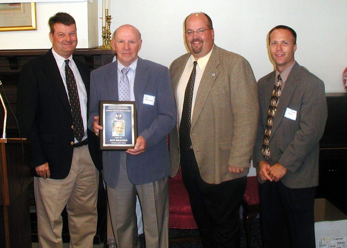 Ron Bracken, then-sports editor for the Centre Daily Times, was selected as the 2005 Pennsylvania State Athletic Conference George Heaslip Media Award winner.