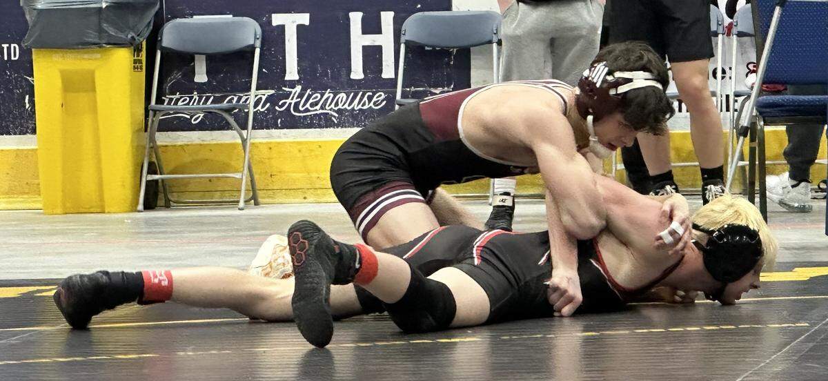 State College’s Luke Young controls Boyertown’s Carter Fogle in their 121-pound bout on Saturday, Feb. 7, 2026 in 1st Summit Arena in Johnstown at the consolation quarterfinals of the PIAA Class 3A Team Wrestling Championships. Young earned an 18-2 technical fall in 3:28, but the Little Lions lost overall 29-27.