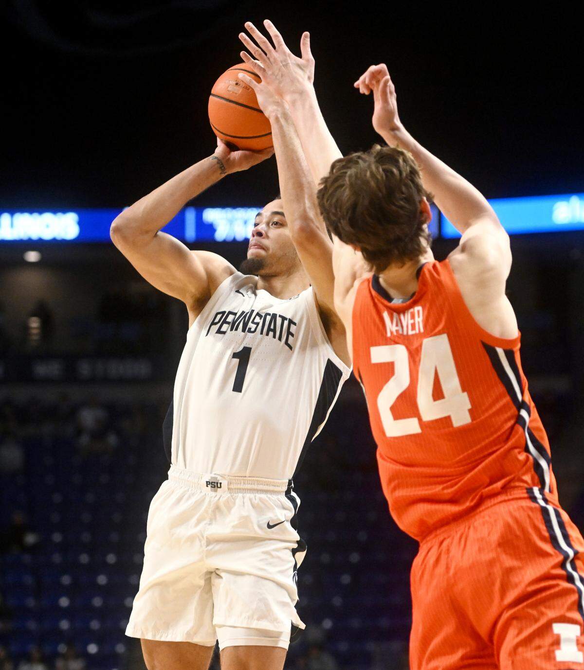 Penn State’s Seth Lundy makes a three as he is fouled by Illinois’ Matthew Mayer during the game on Tuesday, Feb. 14, 2023.