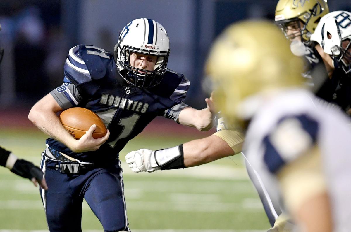 Philipsburg-Osceola’s Kaleb Stamm tries to run past Bald Eagle Area defenders during the game on Friday, August 30, 2019.