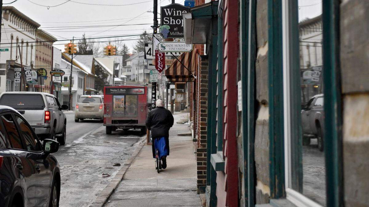 Shops including Penns Valley Jewelers & Cottage Rose Interiors on East Main Street in Millheim.