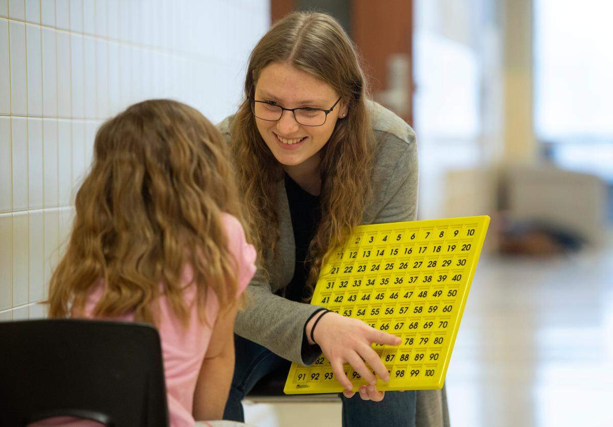 Penns Valley senior Rayanne Witmer works with a kindergarten student at Penns Valley Elementary on Feb. 3.