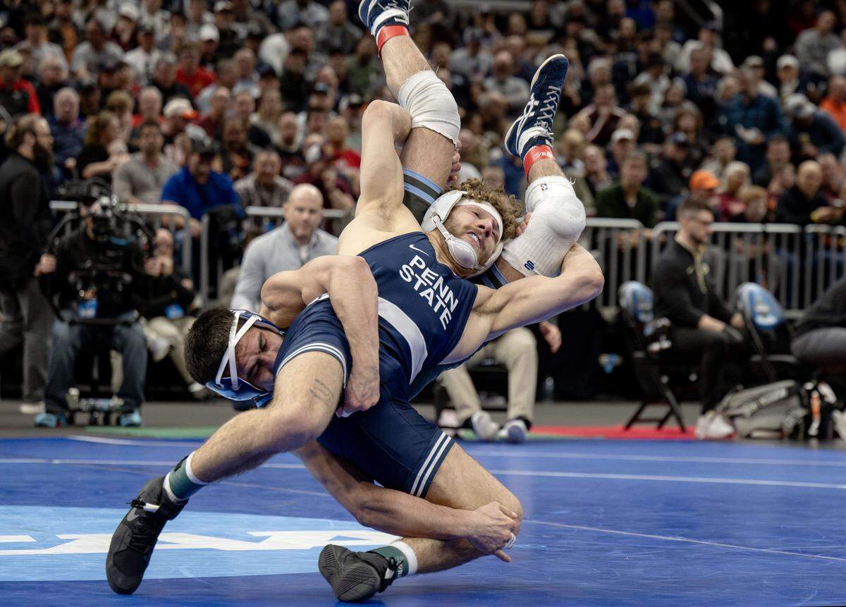Penn State's Mitchell Mesenbrink wrestles Columbia’s Cesar Alvan in a 165-pound semifinal bout of the NCAA wrestling championships on Friday, March 20, 2026.  