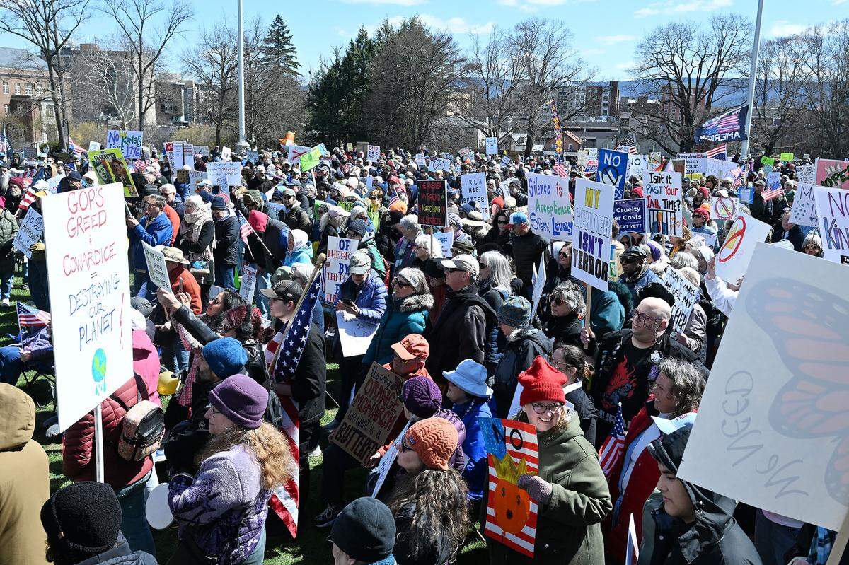 Thousands of people carrying signs gathered on Old Main lawn for the No Kings anti-Trump rally on Saturday.