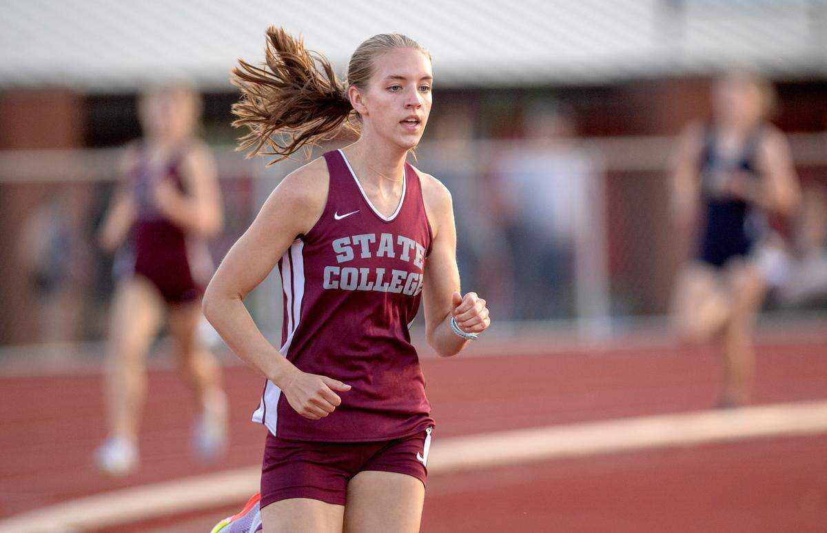 State College’s Grace Morningstar leads the 800 meter run during the District 6 3A track and field championships on Thursday, May 19, 2022 at Mansion Park.
