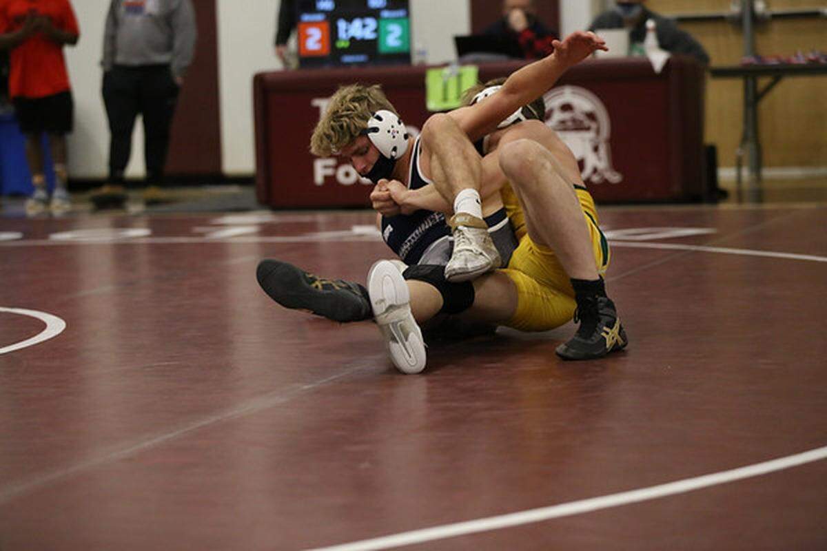 Philipsburg-Osceola’s Hunter Weitoish attempts to escape from Forest Hills’ Ryan Weyandt in their 160 lb championship match on Saturday during the District 6 Class 2A Championships in Altoona.