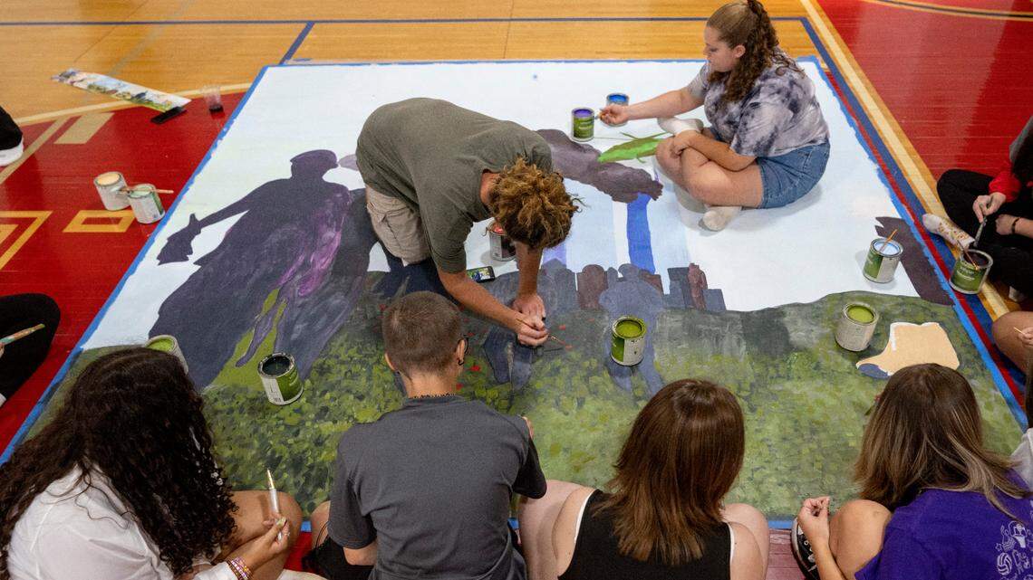 ‘Something to show that we care.’ P-O students help paint mural on 9/11 anniversary