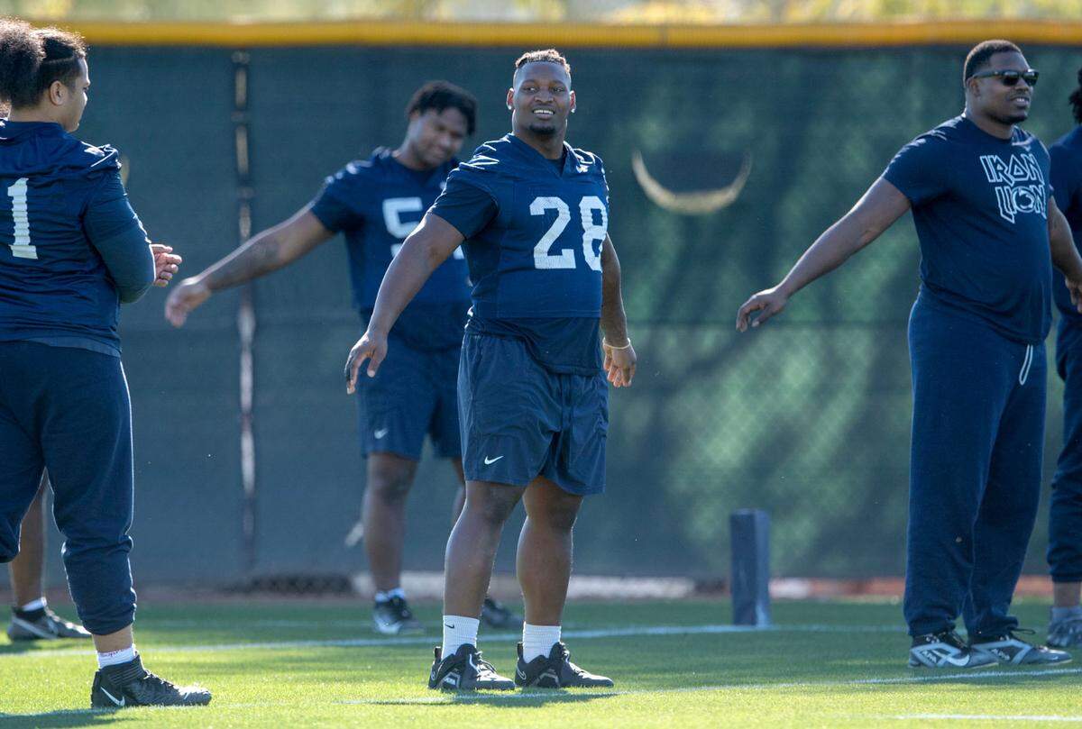 Penn State defensive tackle Zane Durant stretches at the start of practice for the Fiesta Bowl on Sunday, Dec. 29, 2024 at Tempe Diablo Stadium.
