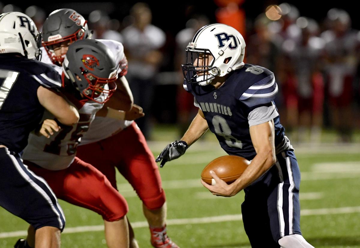 Philipsburg-Osceola’s Dakota Hofe runs with the ball during the game on Friday, Sept. 27, 2019.