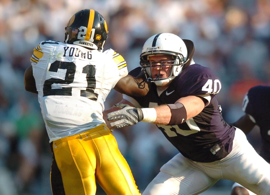 Dan Connor tackles Iowa's Albert Young.  Penn State beatIowa 27-7 on  Saturday, October 6, 2007.  CDT/Nabil K. Mark