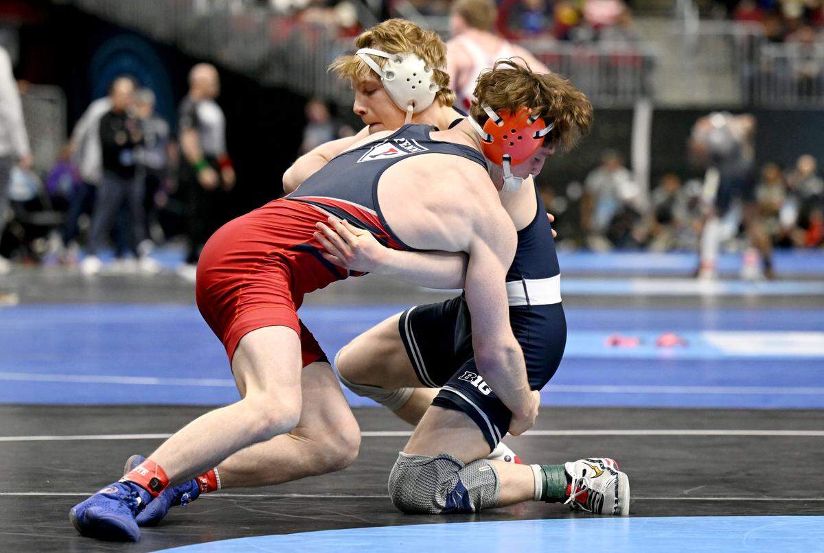 Penn State's Braeden Davis faces Penn’s CJ Composto in a 141-pound consolation bout at the NCAA Wrestling Championships on Friday, March 20, 2026.