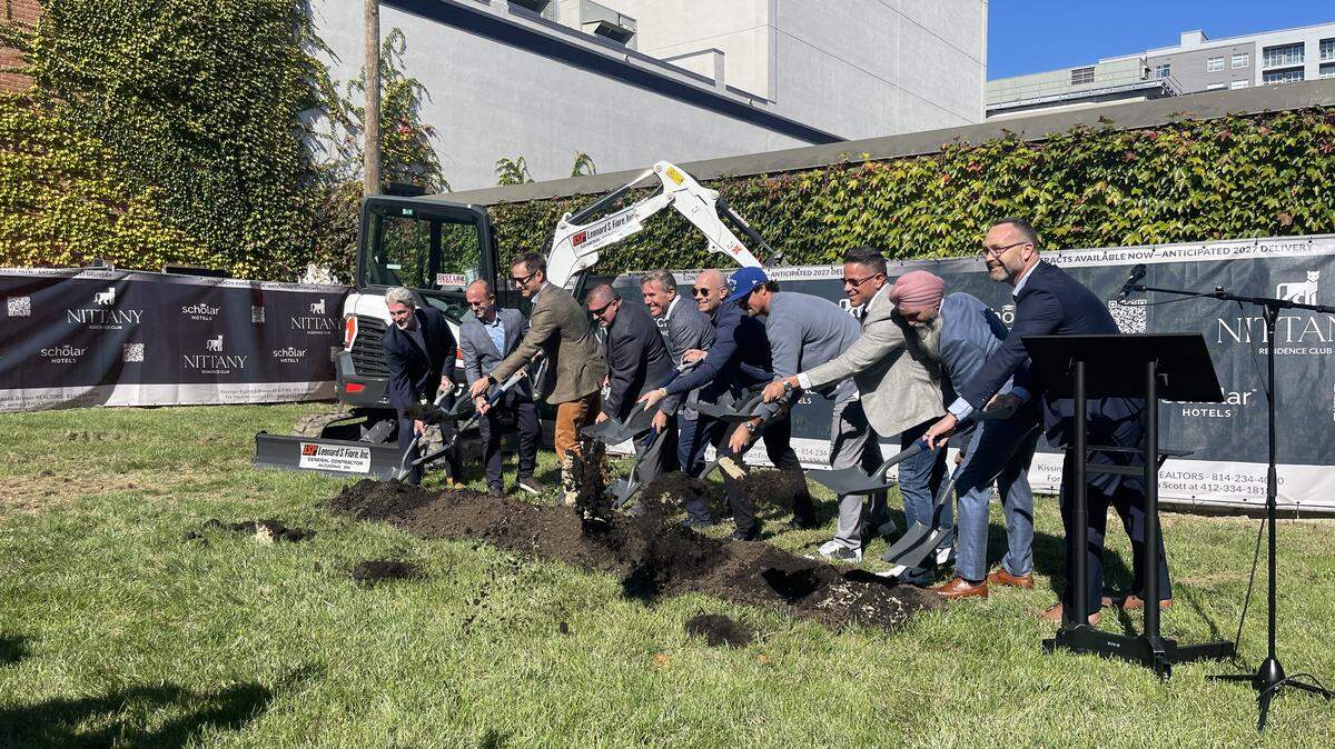 Project partners alongside Centre County business and development leaders, and elected officials ceremoniously break ground on the new Nittany Residence Club at 321 West Beaver Ave., State College on Oct. 10.