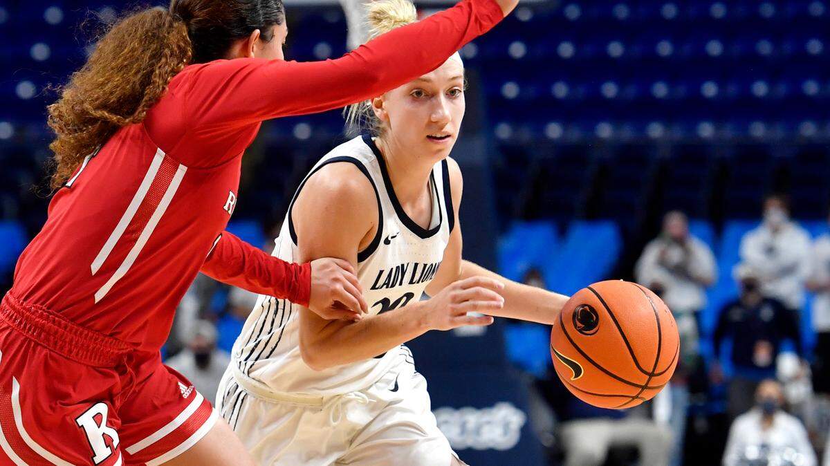 Penn State’s Makenna Marisa dribbles around a Rutgers defender during the Dec. 9 game. Marisa has been named to the All-Big Ten first team by the coaches and media.