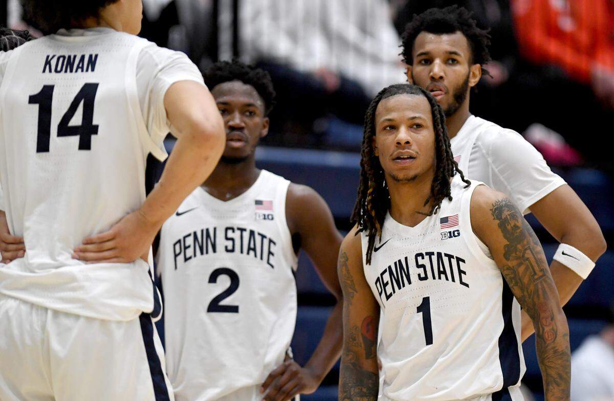 Penn State’s Ace Baldwin Jr. and his teammates watch in disappointment as an Ohio State player makes a foul shot during the game on Thursday, Jan. 30, 2025 at Rec Hall.