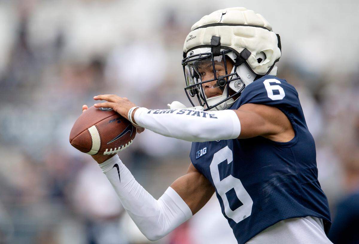 Penn State cornerback Zakee Wheatley makes a catch during warmups for the Blue-White game on Saturday, April 23, 2022.