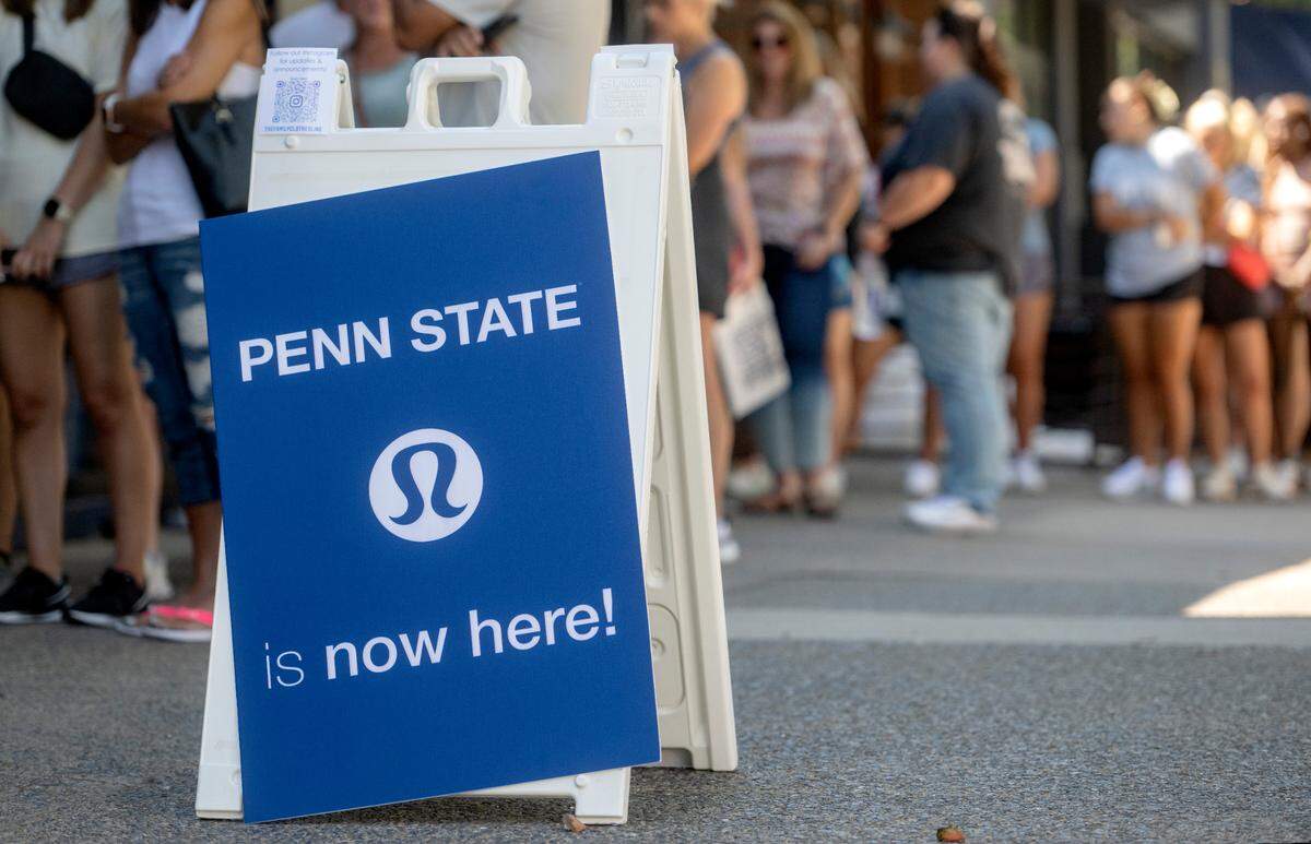 Customers line up outside of Family Clothesline to purchase Lululemon’s Penn State collection on Friday, Aug. 19, 2022.