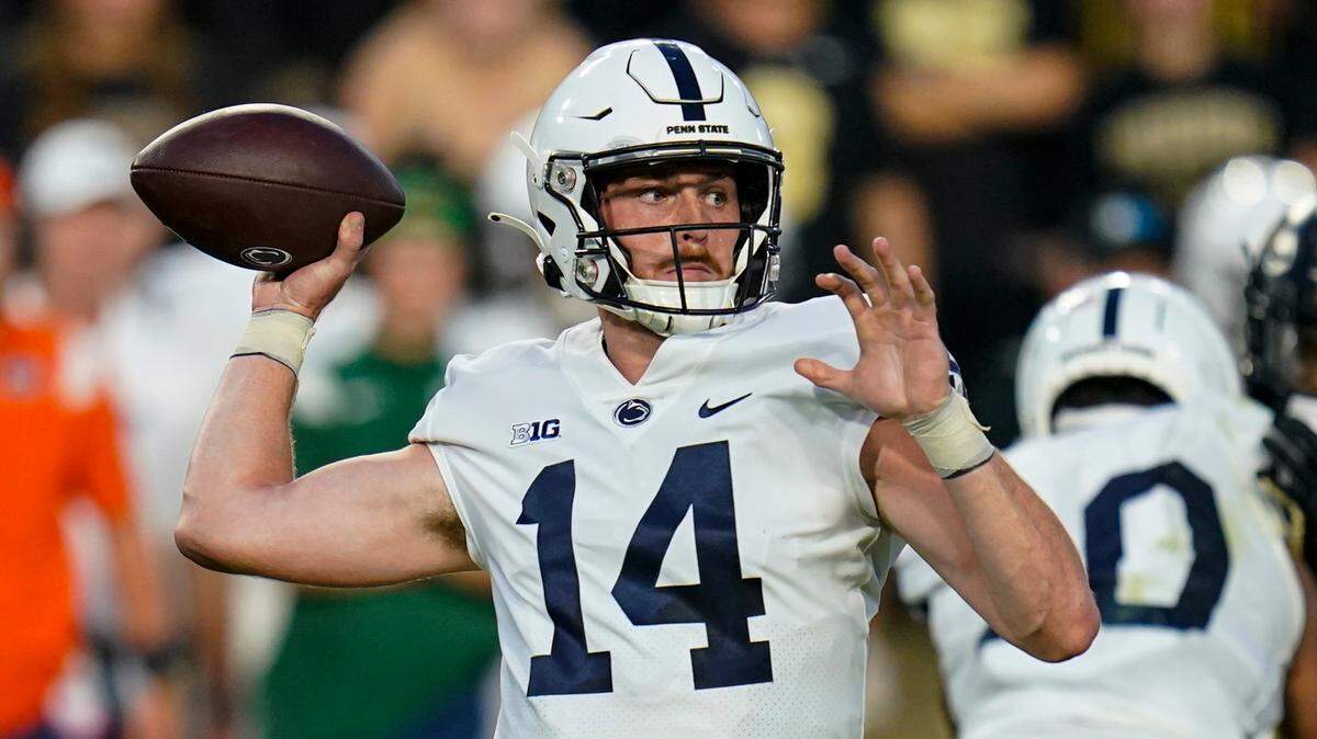 Penn State quarterback Sean Clifford (14) throws a pass against Purdue during the first half of an NCAA college football game in West Lafayette, Ind., Thursday, Sept. 1, 2022.
