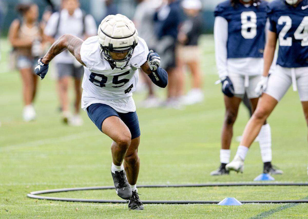 Penn State wide receiver Harrison Wallace III runs a drill during the first day of practice on Monday, Aug. 1, 2022.