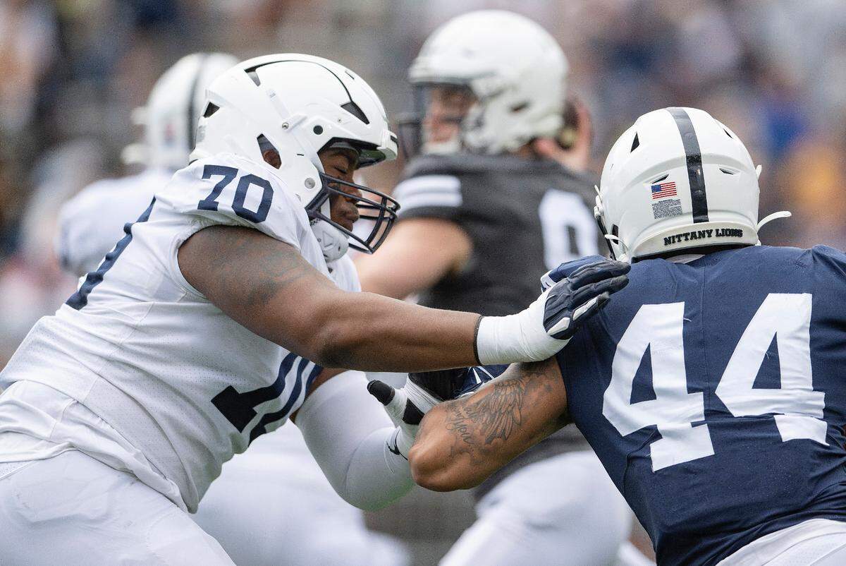 Offensive lineman J’ven Williams tries to stop defensive end Chop Robinson during the Penn State Blue-White game on Saturday, April 15, 2023.