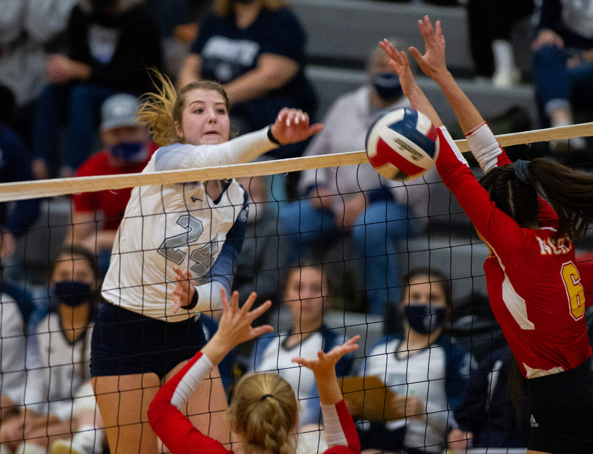 Philipsburg-Osceola’s Reese Hazelton (24) spikes the ball during the PIAA Class 2A semifinal game against North Catholic High School in Cranberry Township on Tuesday, Nov. 17, 2020. The Lady Mounties defeated the Trojanettes 3-2 and will play in the state championship on Saturday.