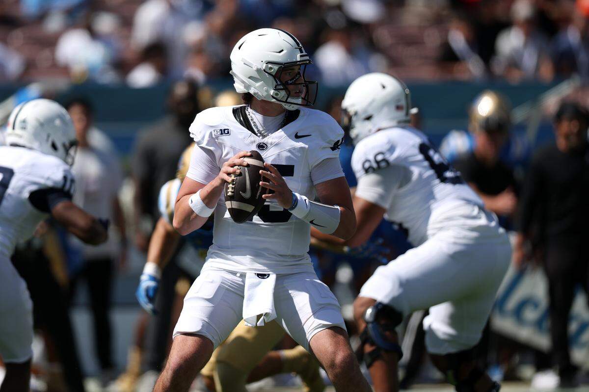 Oct 4, 2025; Pasadena, California, USA; Penn State Nittany Lions quarterback Drew Allar (15) looks to pass during the first quarter against the UCLA Bruins at Rose Bowl. Mandatory Credit: Kiyoshi Mio-Imagn Images