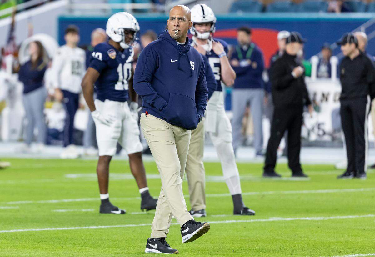 Penn State Nittany Lions head coach James Franklin watches his players warm up before the start of their NCAA Playoff Semifinal Capital One Orange Bowl football game against the Notre Dame Fighting Irish at Hard Rock Stadium on Thursday, Jan. 9, 2025, in Miami Gardens, Fla.