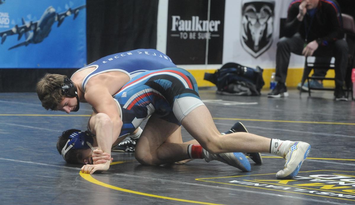 Penns Valley’s Ty Watson controls Kane’s Reece Bechakas in their 152-pound first round match of the PIAA Class 2A Championships on Thursday, March 9, 2023 at the Giant Center in Hershey. Watson pinned Bechakas in 3:32
