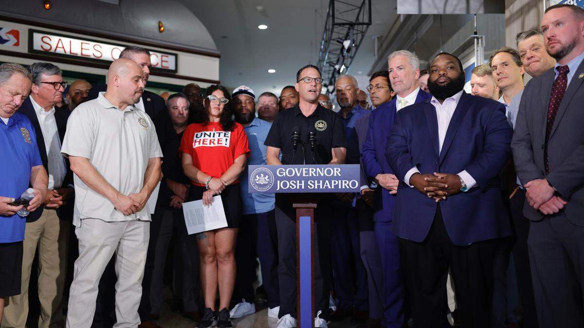 Gov. Josh Shapiro, fellow Democrats, SEPTA officials, and others call for transit funding in Philadelphia in August, 2025.