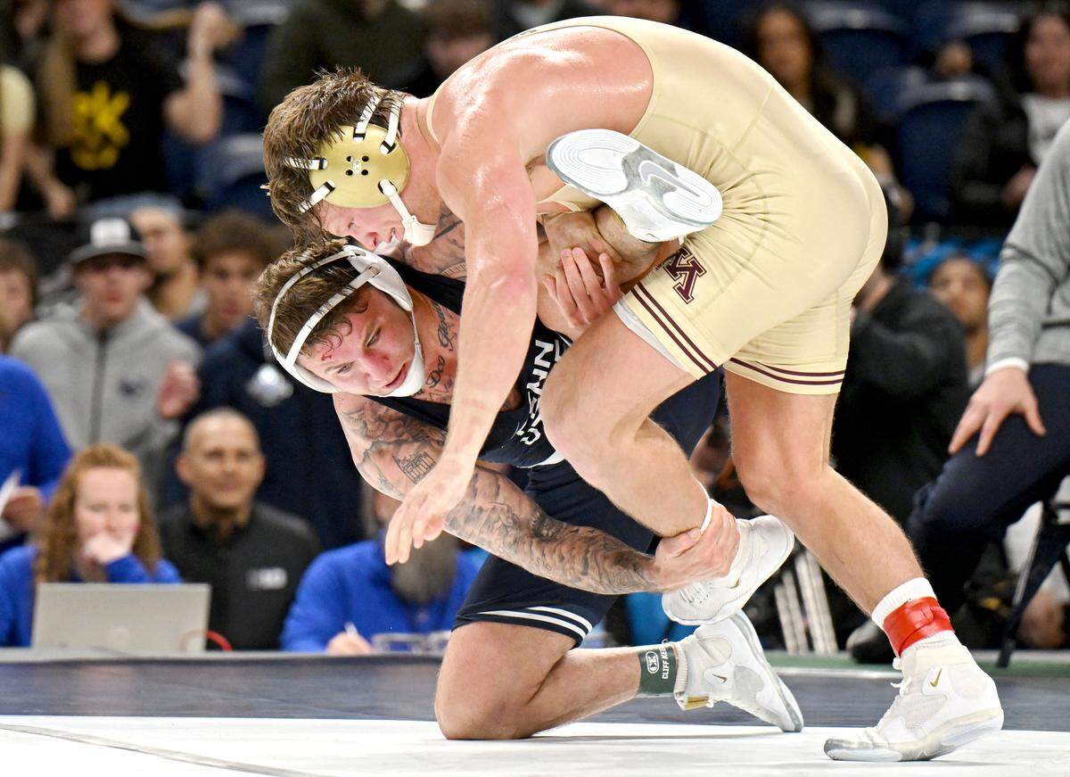 Penn State's Rocco Welsh wrestles Minnesota’s Max McEnnelly in the 184-pound championship bout at the Big Ten wrestling championships on Sunday, March 8, 2026.