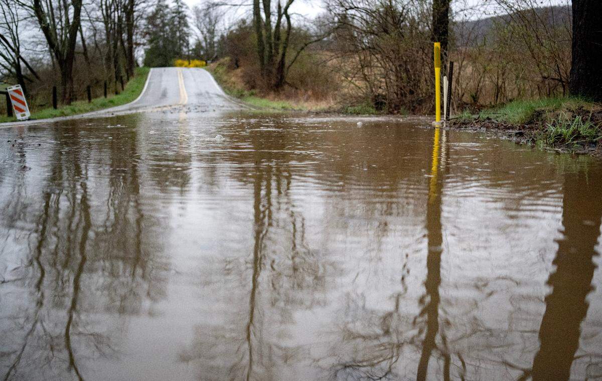 Water floods a portion of Buffalo Run Road on Wednesday, April 3, 2024.