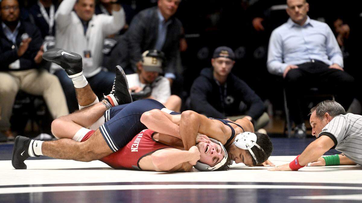 Penn State’s Shayne Van Ness controls Lock Haven’s Connor Eck in the 149 lb bout of the match on Friday, Nov. 11, 2022 .