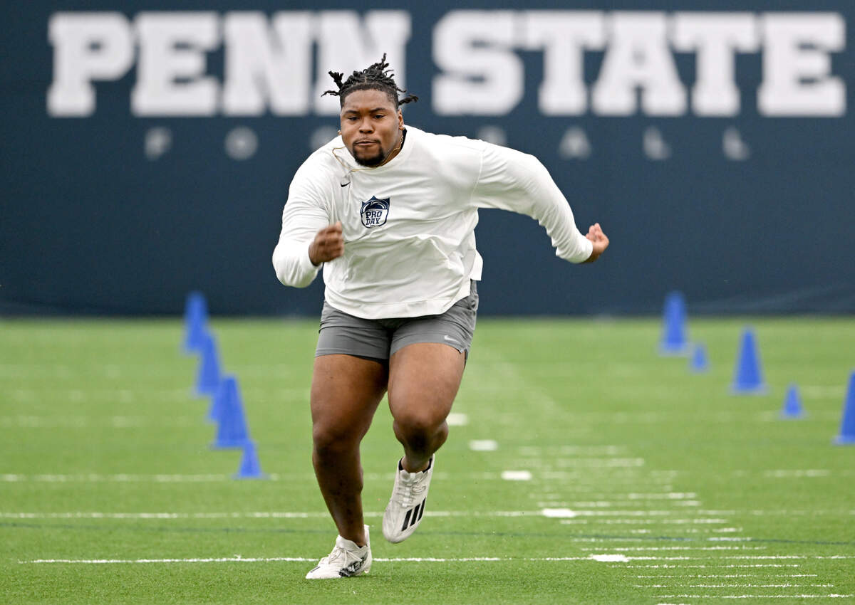 Offensive lineman Camden Wallace runs a skill test during Penn State’s Pro Day on Friday, March 15, 2024 in Holuba Hall.