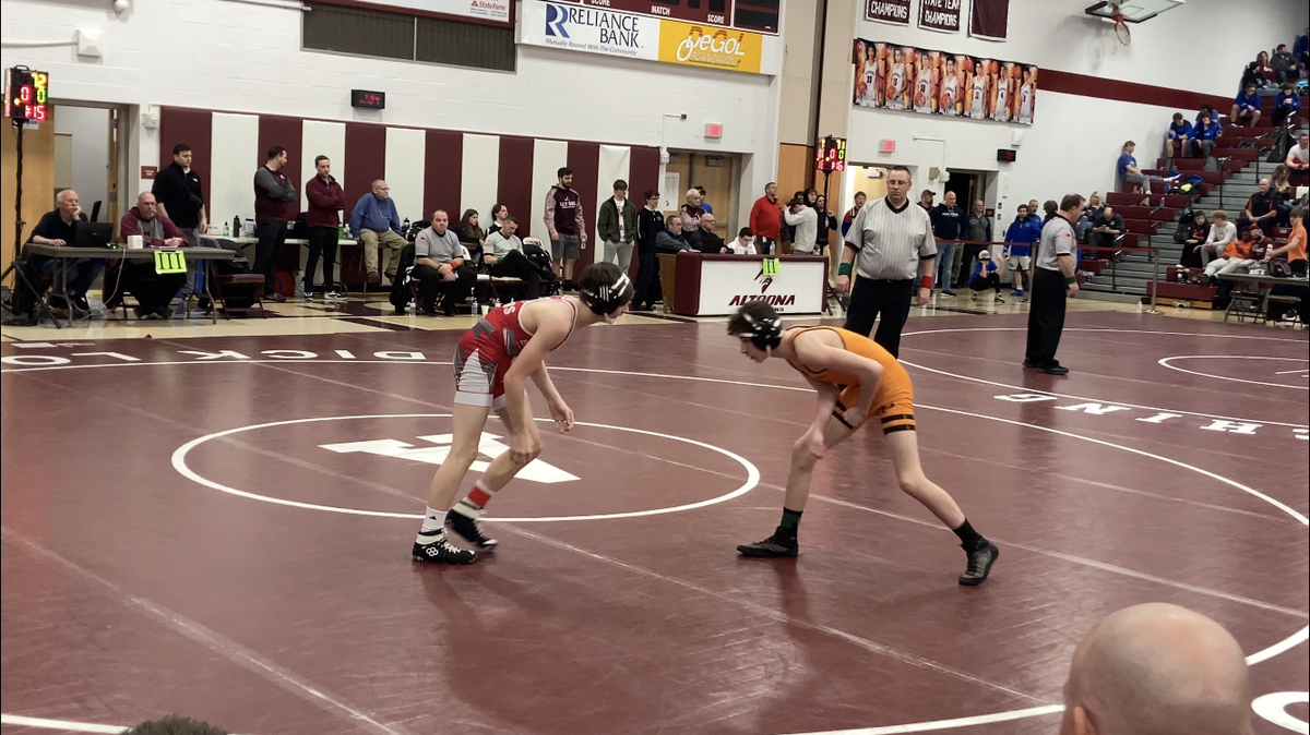 Bellefonte’s Cameron Garcia (106) takes on Cathedral Prep’s Keegan Oler in Friday’s PIAA Northwest 3A Regional quarterfinal.
