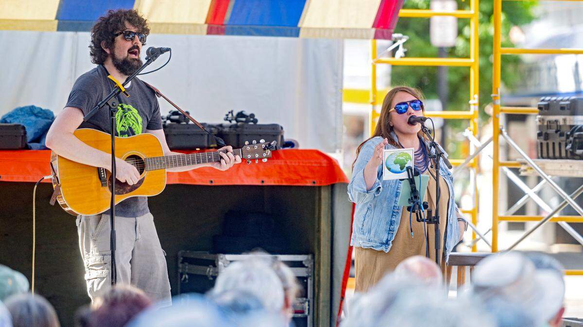 Hops & Vines entertains the crowd on the Allen Street Stage during the Central Pennsylvania Festival of the Arts on Friday, July 12, 2024. Hops and Vines is a made up of Jonathan McVerry and Christie Clancy.