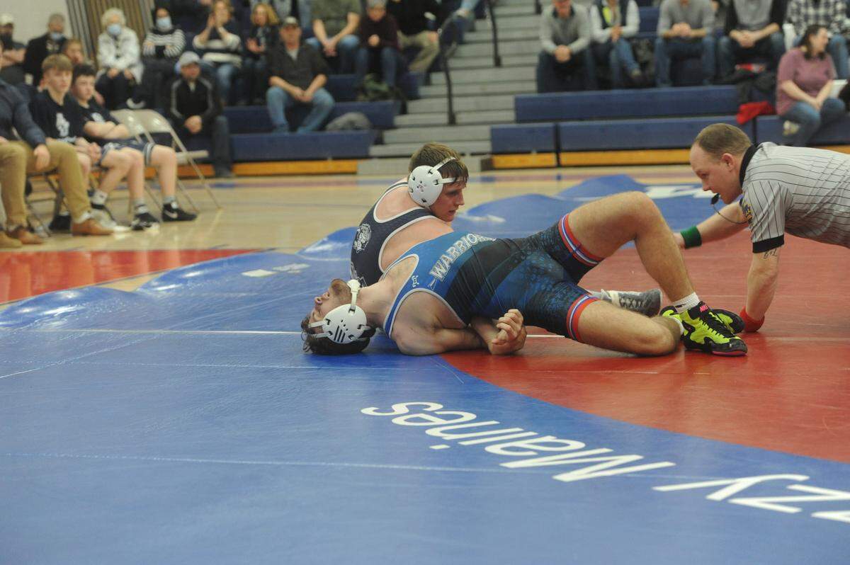 Philipsburg-Osceola’s Luke Hughes, pictured here in a dual on Feb. 8, was one of three Mounties wrestlers to earn a No. 2 seed for the District 6 Class 2A Championships.