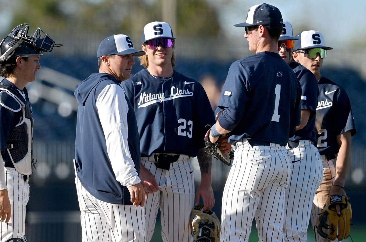 Penn State baseball coach Mike Gambino talks to the infielders during a pitching change in the game against Rider on Wednesday, April 30, 2025 at Medlar Field.
