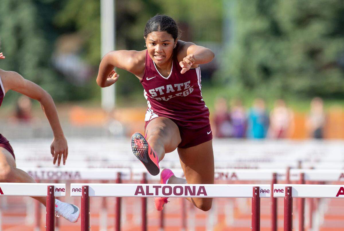 State College’s Sarah Tate wins the 100 meter hurdles during the District 6 3A track and field championships on Thursday, May 19, 2022 at Mansion Park.