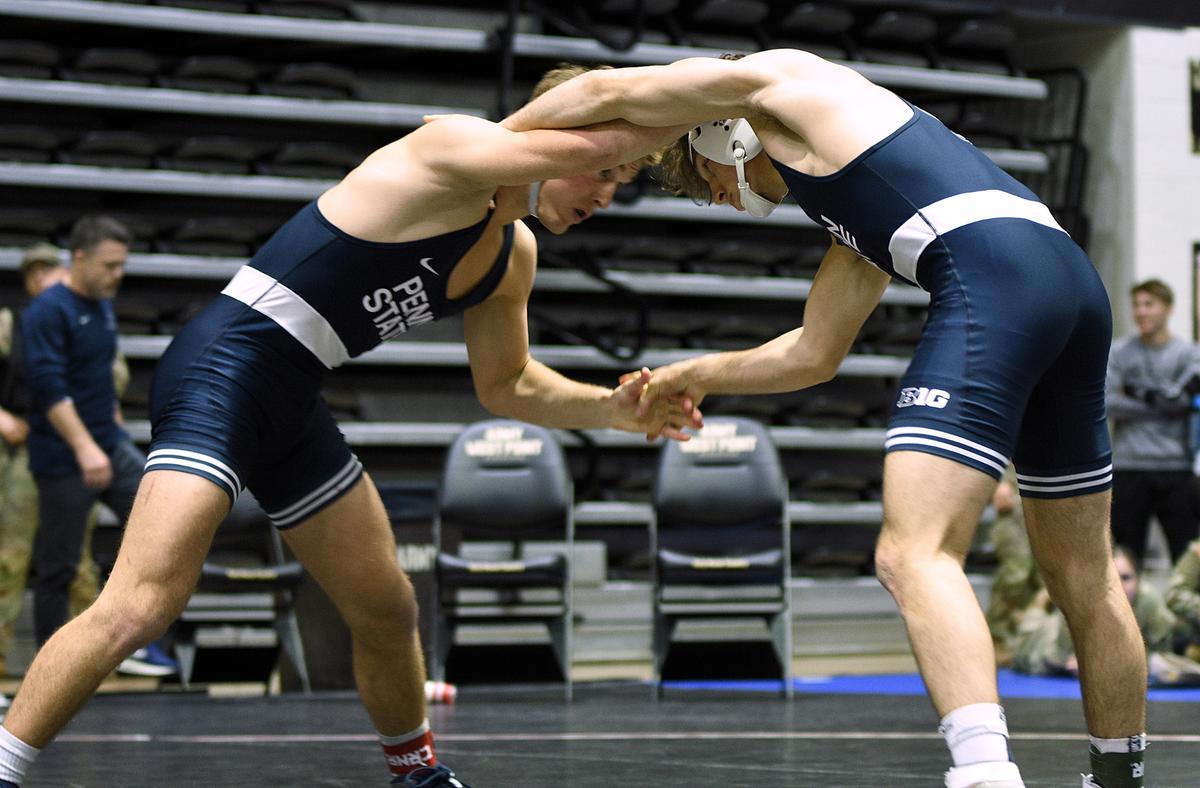 Penn State’s Terrell Barraclough, left, and teammate Levi Haines looking for an opening in their 157-pound Black Knight Invite championship bout on Sunday at West Point, N.Y. Haines topped Barraclough, 2-1.