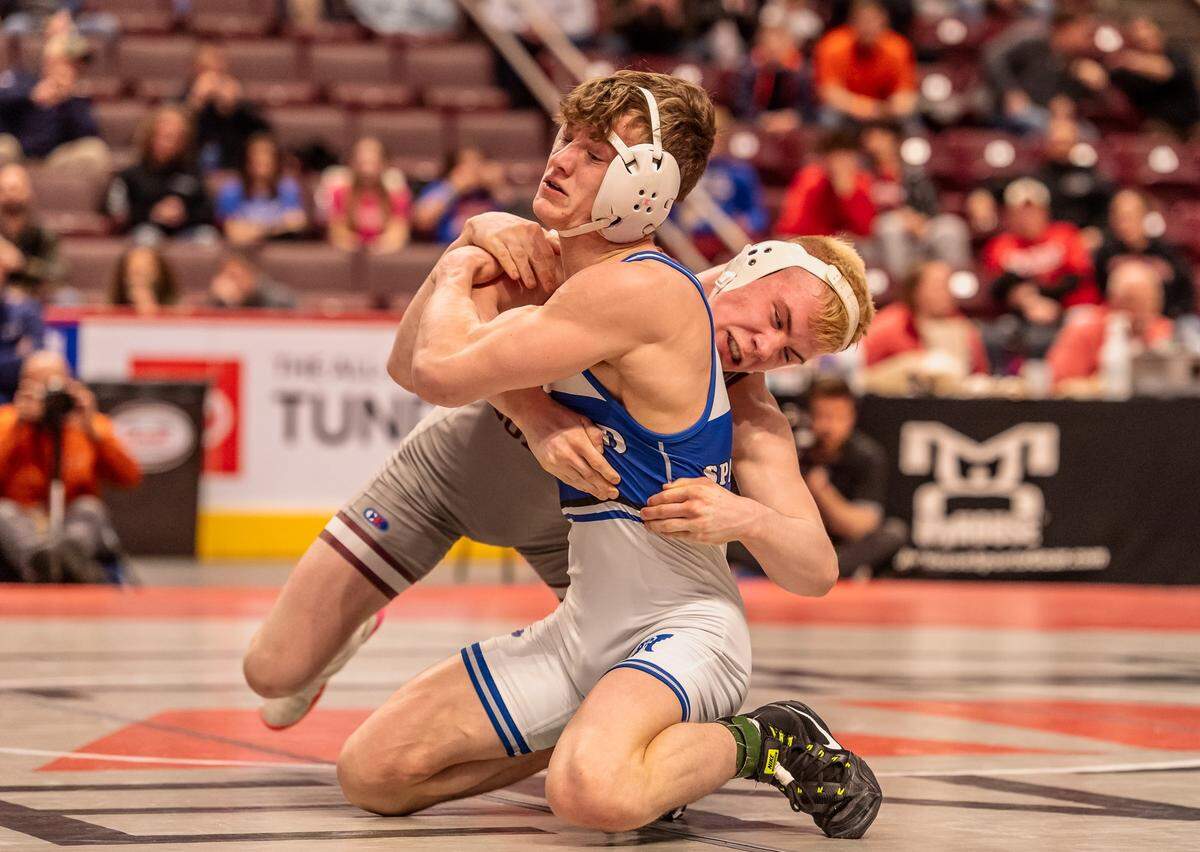 State College’s Pierson Manville controls Hempfield Area’s Briar Priest in their 138-pound title match of the PIAA Class 3A Championships on Saturday, March 12, 2022 at Giant Center in Hershey. Manville beat Priest, 5-4, in ultimate tie breaker No. 2 for his first PIAA title.