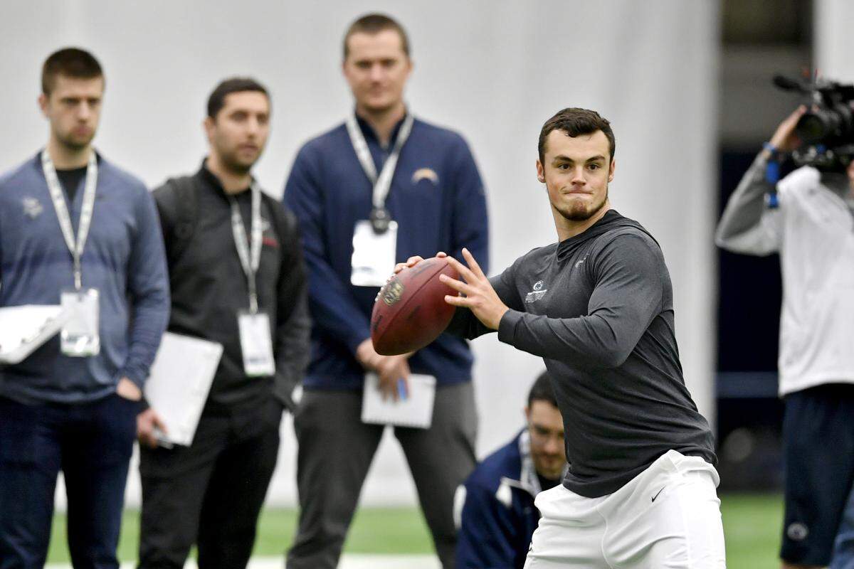 NFL personnel watch as Trace McSorley throws during Pro day on Tuesday, March 19, 2019 at Holuba Hall.