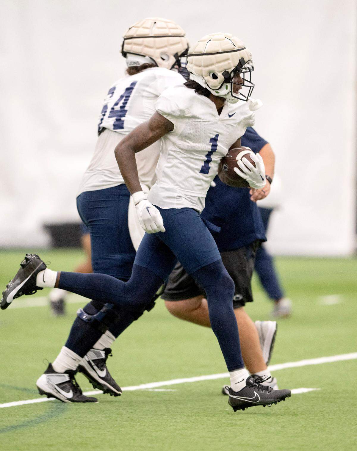 Penn State wide receiver KeAndre Lambert-Smith makes a catch and runs with the ball during practice on Sunday, Aug. 6, 2023.