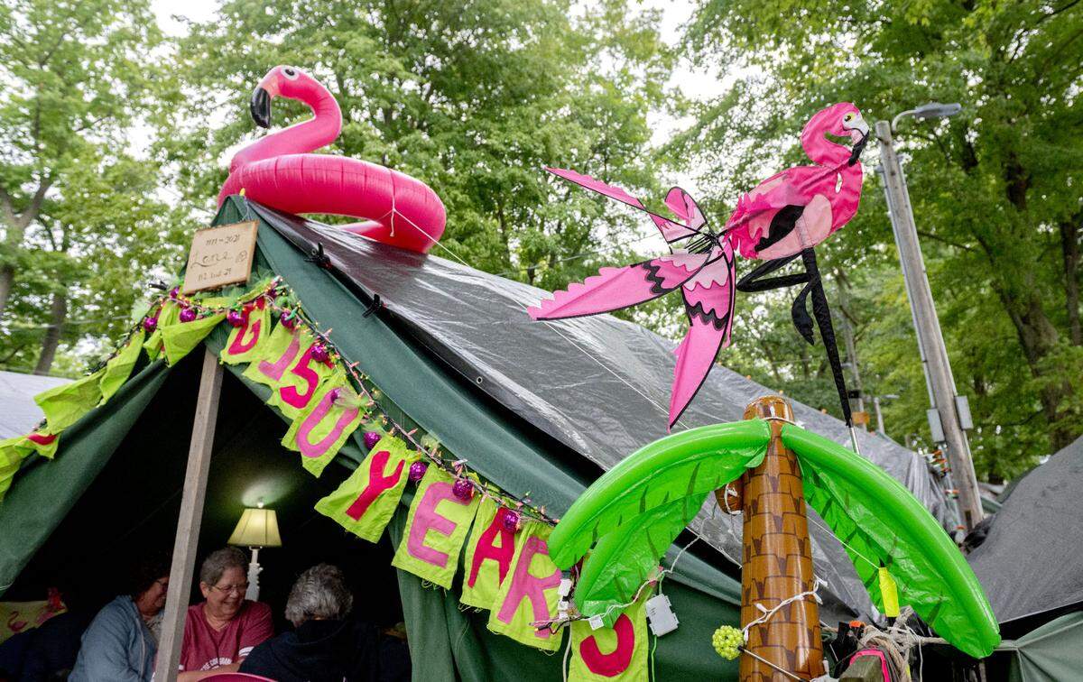 The Lane family tent decorated with flamingos at the Centre County Grange Encampment and Fair on Monday, Aug. 19, 2024.