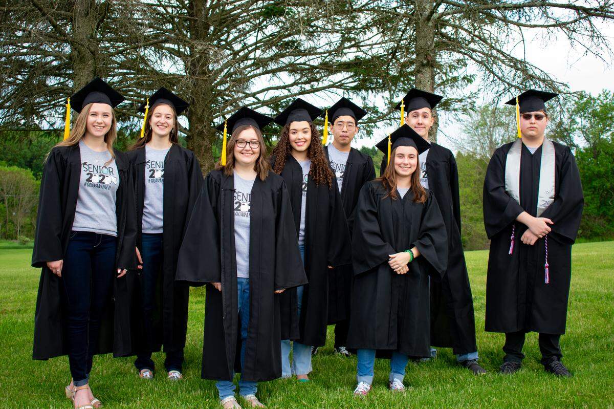 The eight members of the Centre County Christian Academy graduated Saturday in a drive-in ceremony on the Bellefonte school’s soccer field.