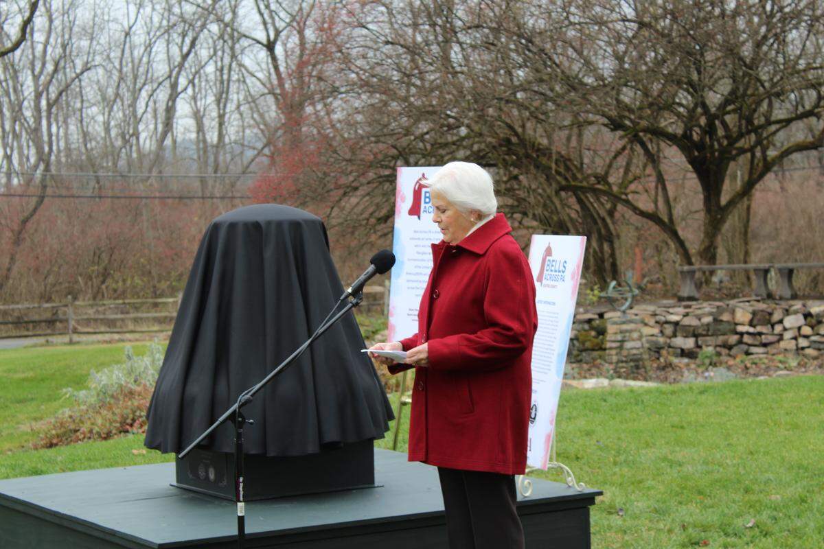 Roland Curtin Foundation President Sue Hannigan speaks Friday at America250PA’s event at Curtin Village.