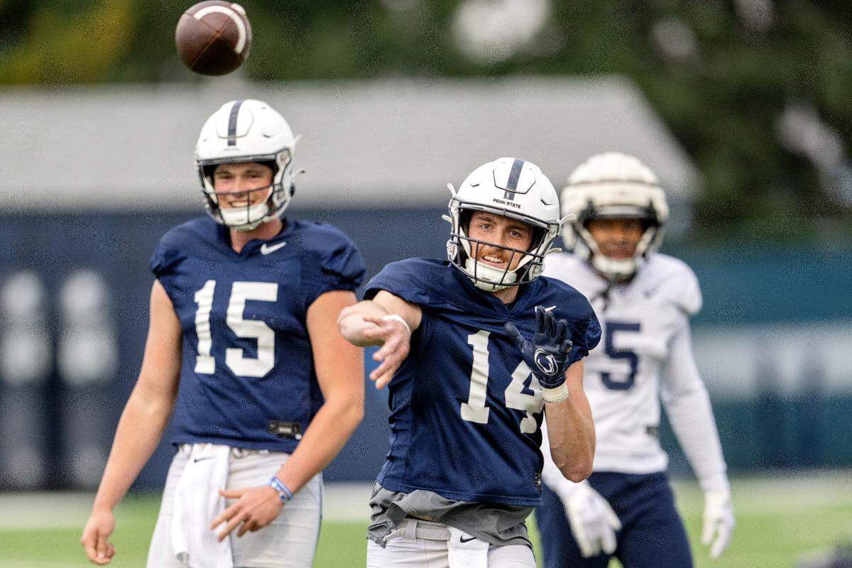 Penn State quarterback Sean Clifford makes a pass during practice on Wednesday, Oct. 12, 2022.