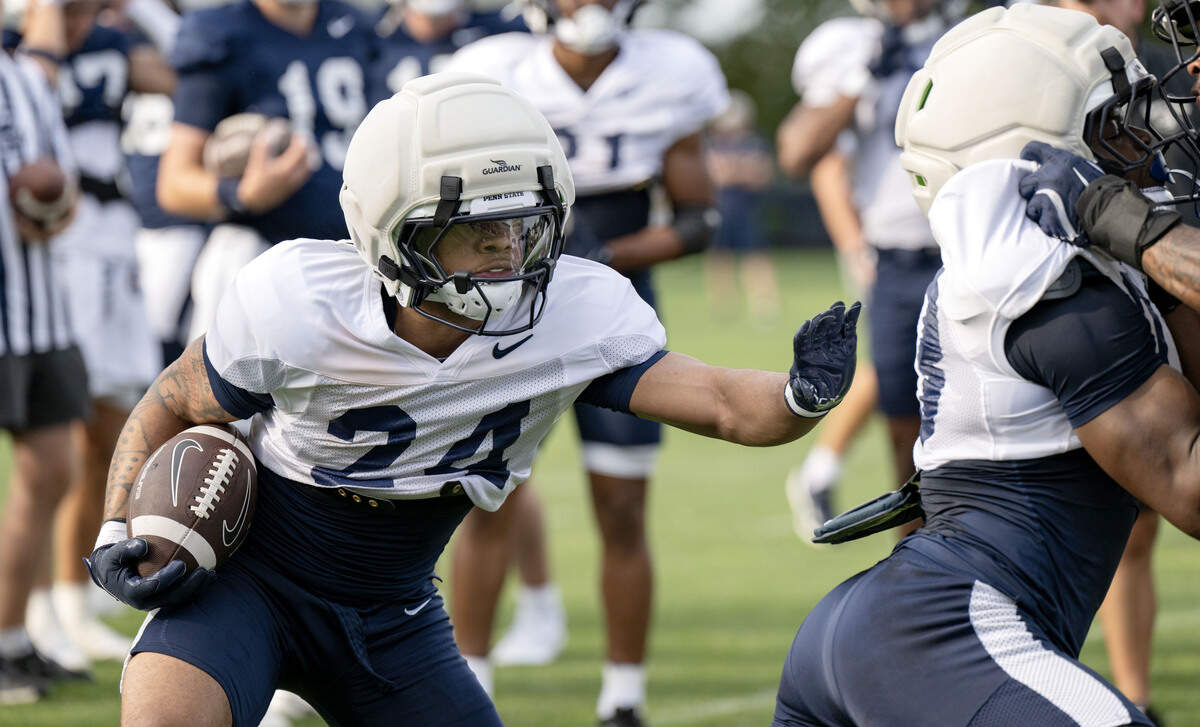 Penn State running back Corey Smith runs a drill during practice on Saturday, Aug. 2, 2025.